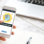 person holding phone with ai app open