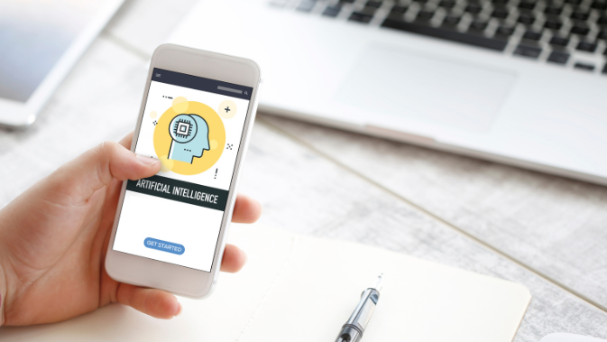 person holding phone with ai app open